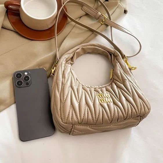 

Цельная новая женская модная сумка в форме полумесяца с рюшами — универсальная сумка через плечо, через плечо и ручной пельменей — кошелек в форме 2026 года