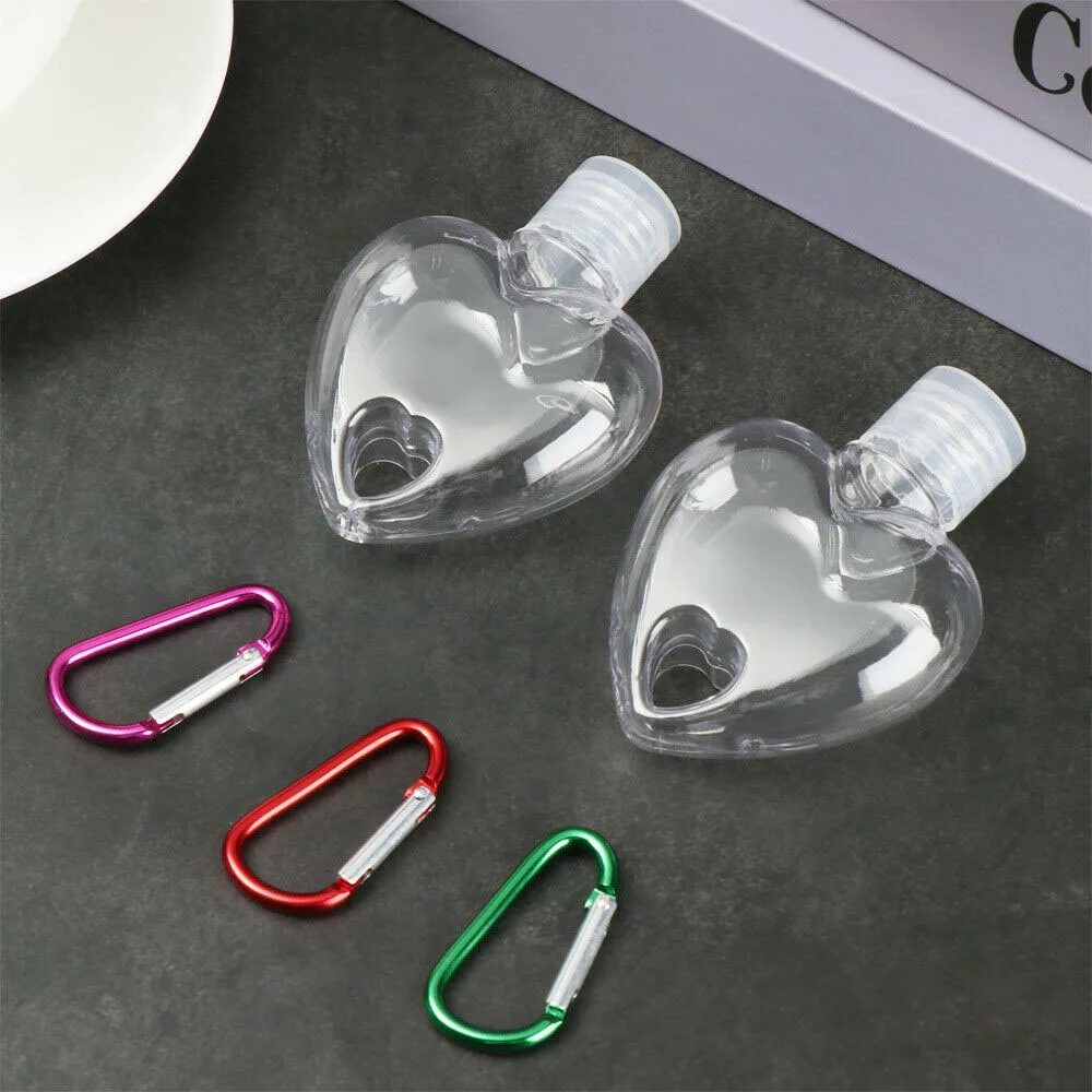Bottiglia spray per contenitore cosmetico vuoto in plastica trasparente a forma di cuore di alta qualità Bottiglia per sapone per le mani Bottiglia riutilizzabile