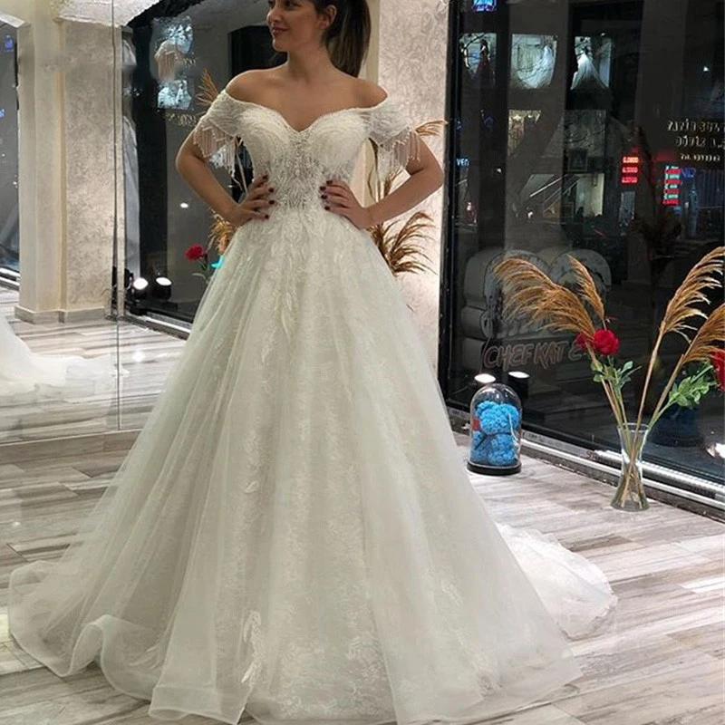 A linha vestidos de noiva princesa fora do ombro frisado borla pérola vestidos de noiva rendas apliques vestido de noiva para mulher