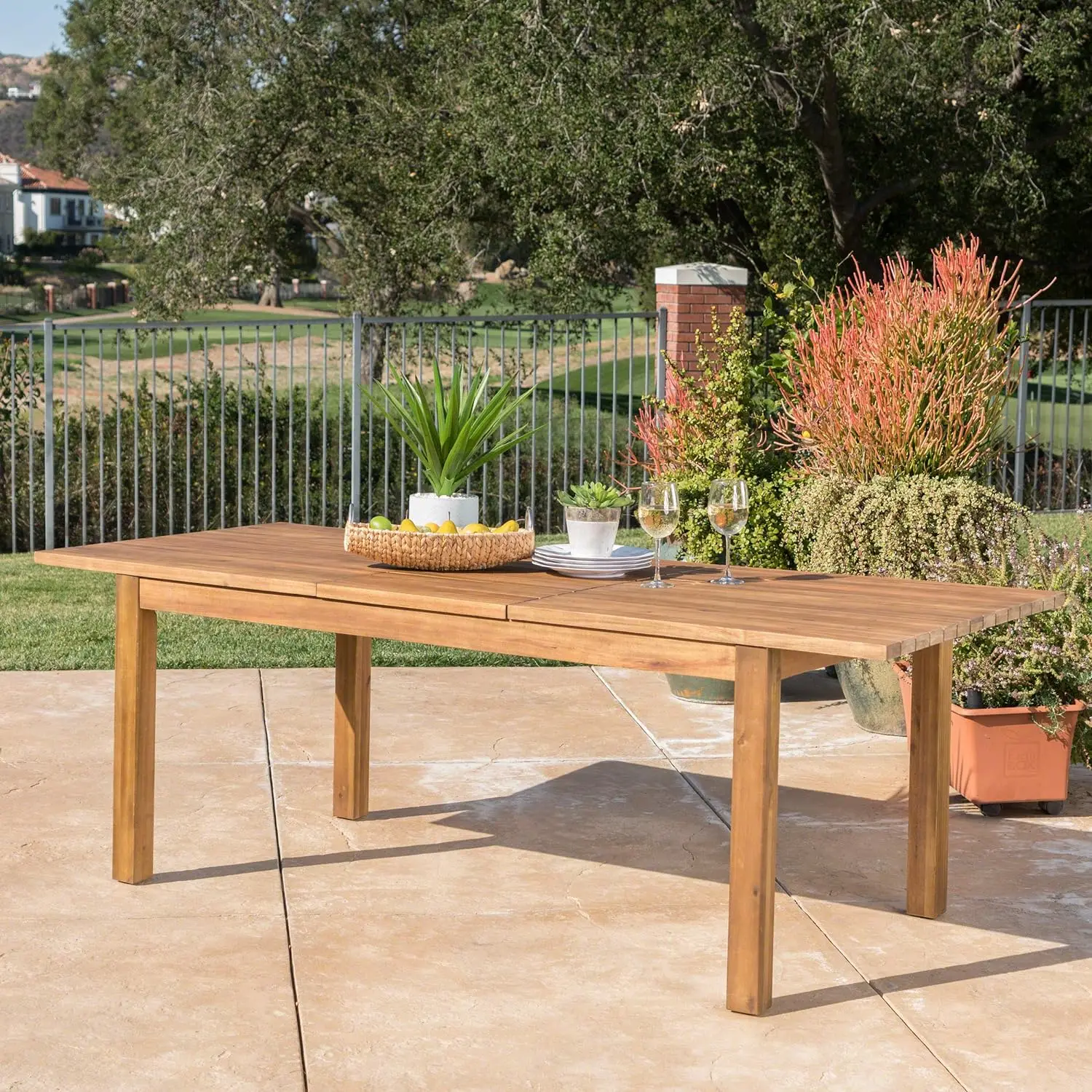 Wilson Outdoor Expandable Acacia Wood Dining Table Teak Finish Simple and Yet Elegant Site of Many Enjoyable Dinners Outdoors