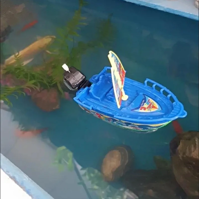 Aufziehbares Schnellboot-Spielzeug, schwimmender Bade-Duschbegleiter für Kinder, klassisches mechanisches Uhrwerk-Design, perfekt zum Spielen im Poolwasser