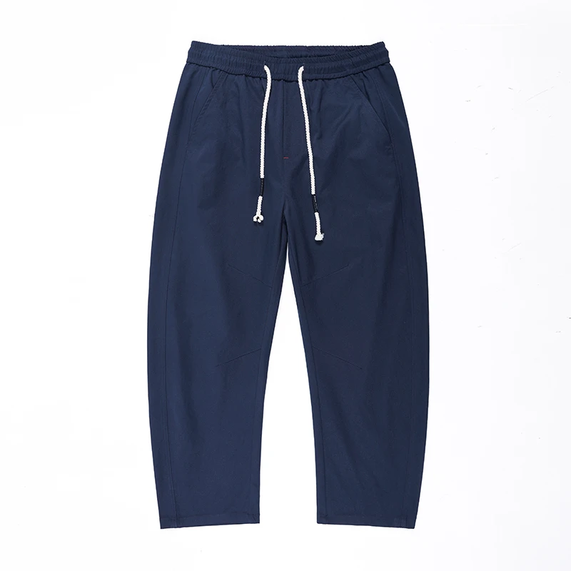 Pantalones de pierna ancha curvados de poliéster para hombre, Pantalones rectos cómodos y versátiles con diseño de cordón, Otoño e Invierno 2025, talla grande 5XL
