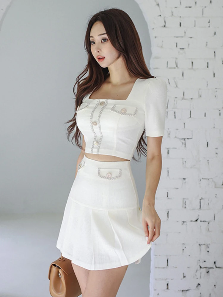 

Женские корейские милые белые короткие юбки из 2 предметов, сексуальные укороченные топы, рубашка Kawaii, блузка, мини-плиссированная юбка, комплекты для уличной вечеринки