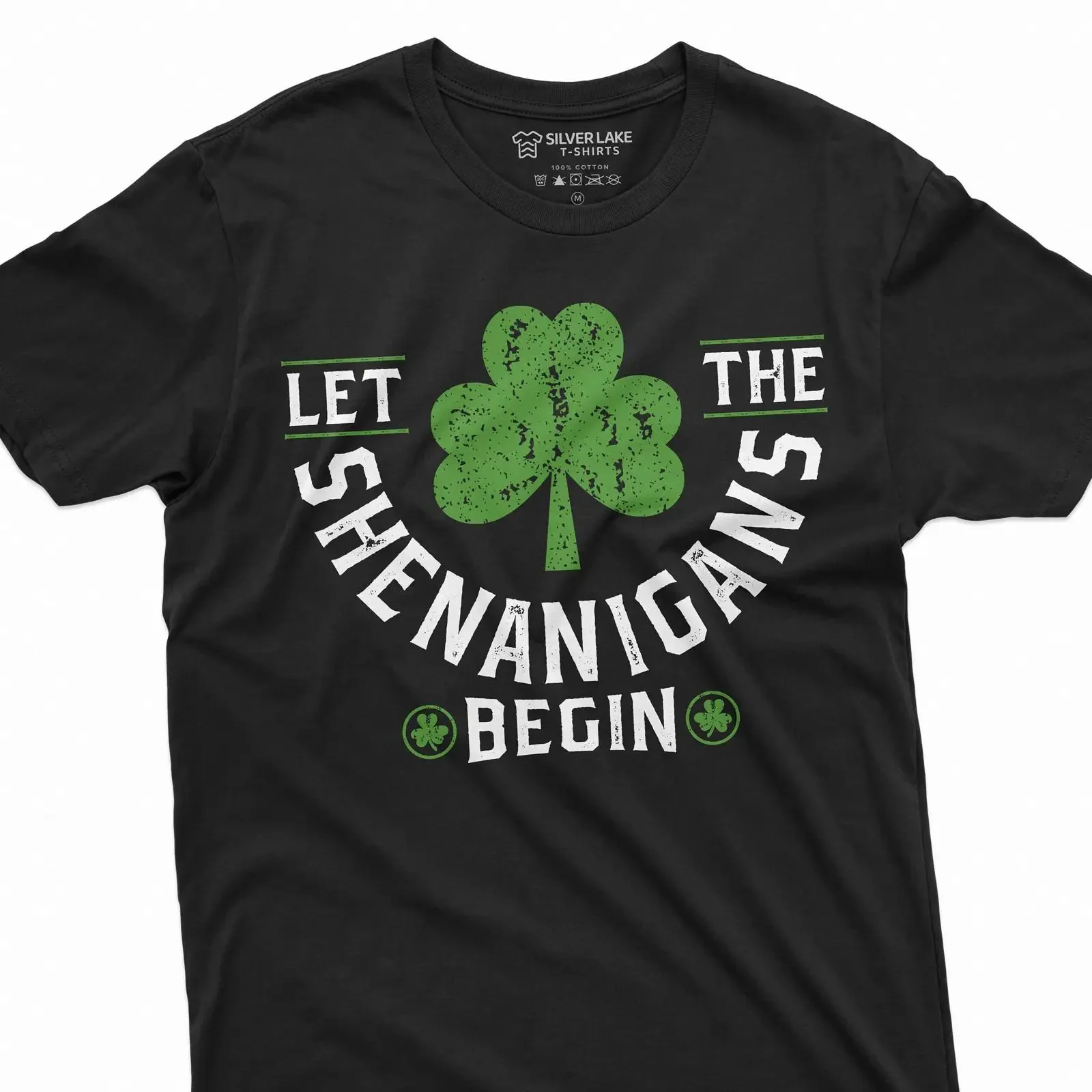 May include Black t shirt with a white graphic that says Let the Shenanigans Begin shamrock design vintage Washed Comfortable
