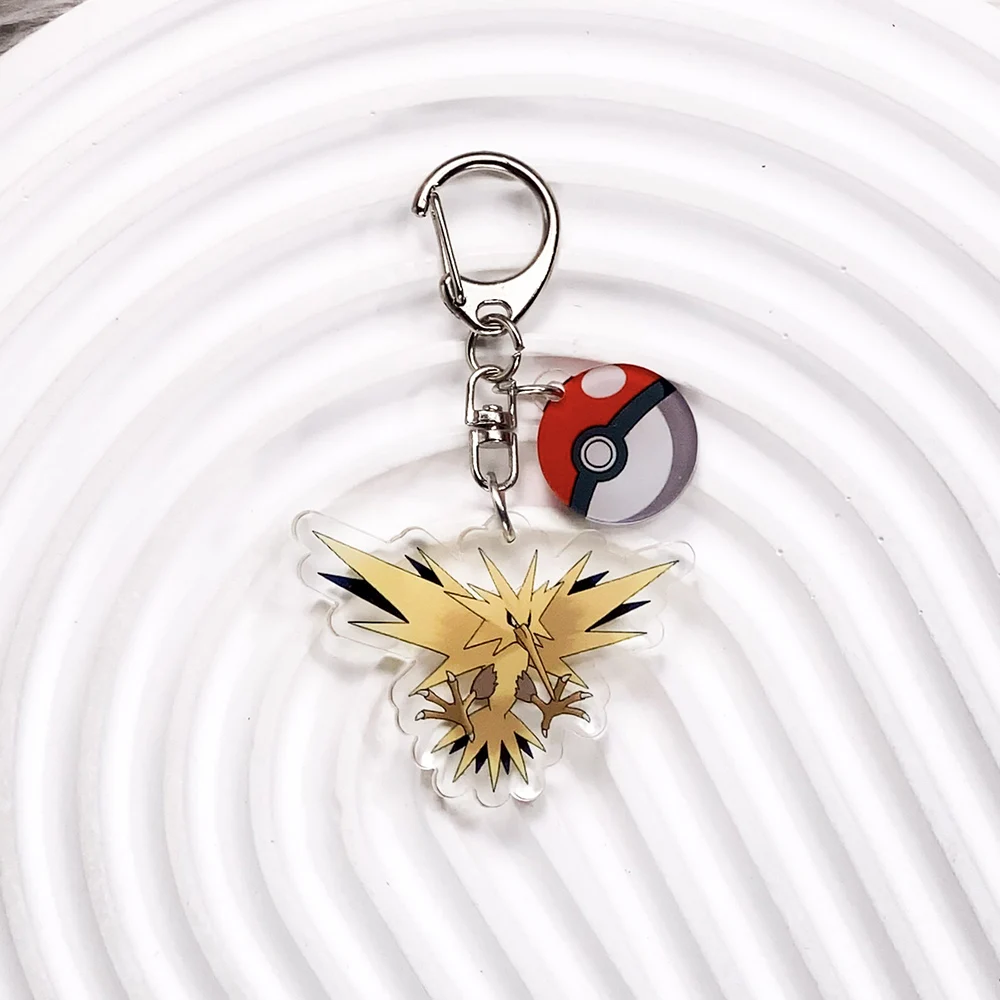Portachiavi in acrilico con personaggi Pokémon: Pikachu, Bulbasaur, Jigglypuff, Ivysaur, Venusaur, Charmander, Charmeleon, Charizard, Squirtle, e tanti altri