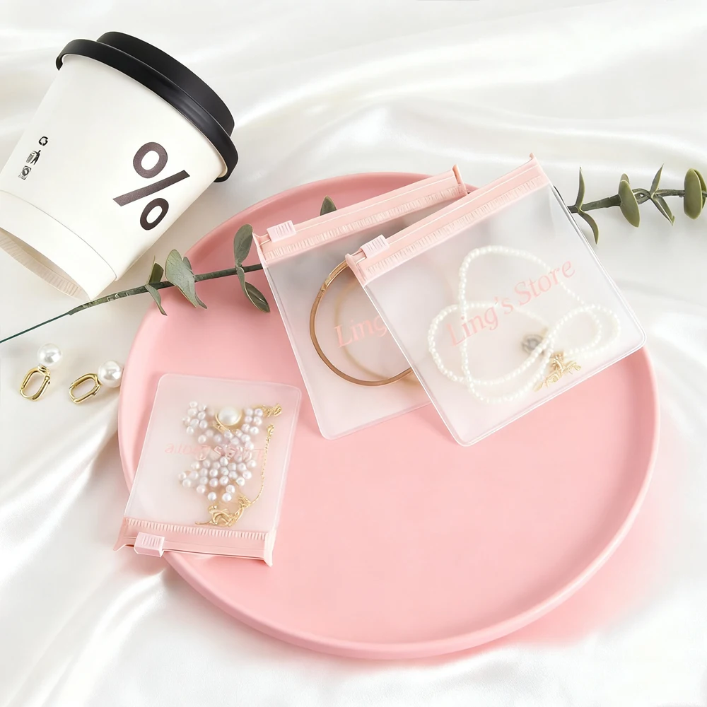 

50/100 шт. розовый индивидуальный логотип, матовая ювелирная сумка на молнии, пластиковый конверт из ЭВА для хранения, кольцо, серьги, ожерелье, браслет, упаковка