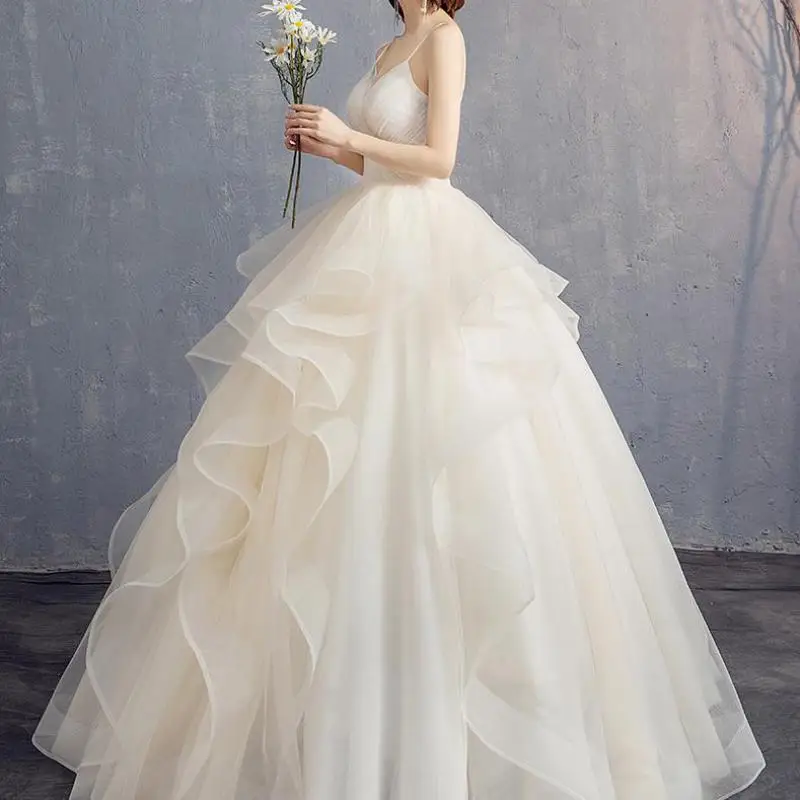 Vestido de novia con tirantes finos a la moda, vestidos de novia clásicos sexis con cuello en V, tul sencillo Sukienka Na Wesele de talla grande personalizado