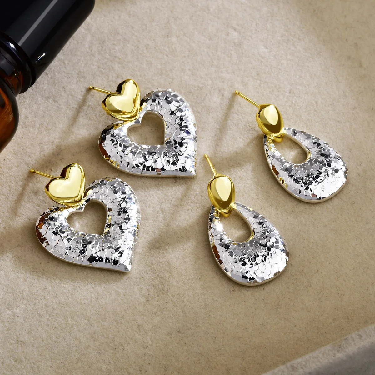 Super flash broken ice contrasting color love water drop stud earrings texture hammer pattern light luxury versatile earrings
