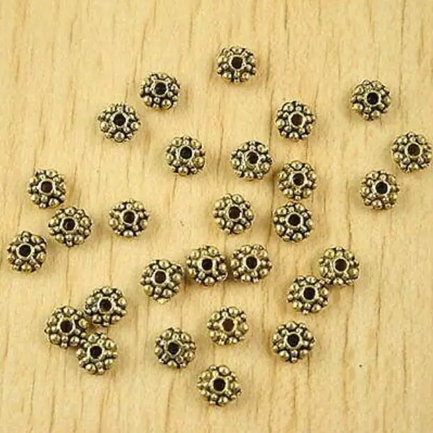 150pcs 5.9*2.9mm hole is 1.5mm dark gold-tone studded flower spacer beads HWH2295