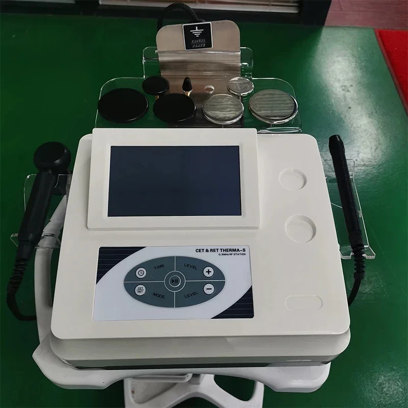 448 كيلو هرتز Indiba Tecar RET CET أحادي القطب RF العلاج بالإنفاذ الحراري شد الوجه إزالة التجاعيد استعادة الألم جهاز تردد الراديو