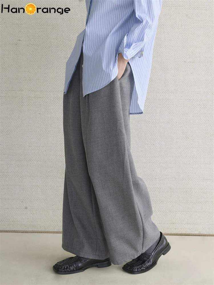 HanOrange 2025 invierno Simple moda compuesto terciopelo plisado cuchillo curvo pantalones silueta suelta pantalones negro/gris claro