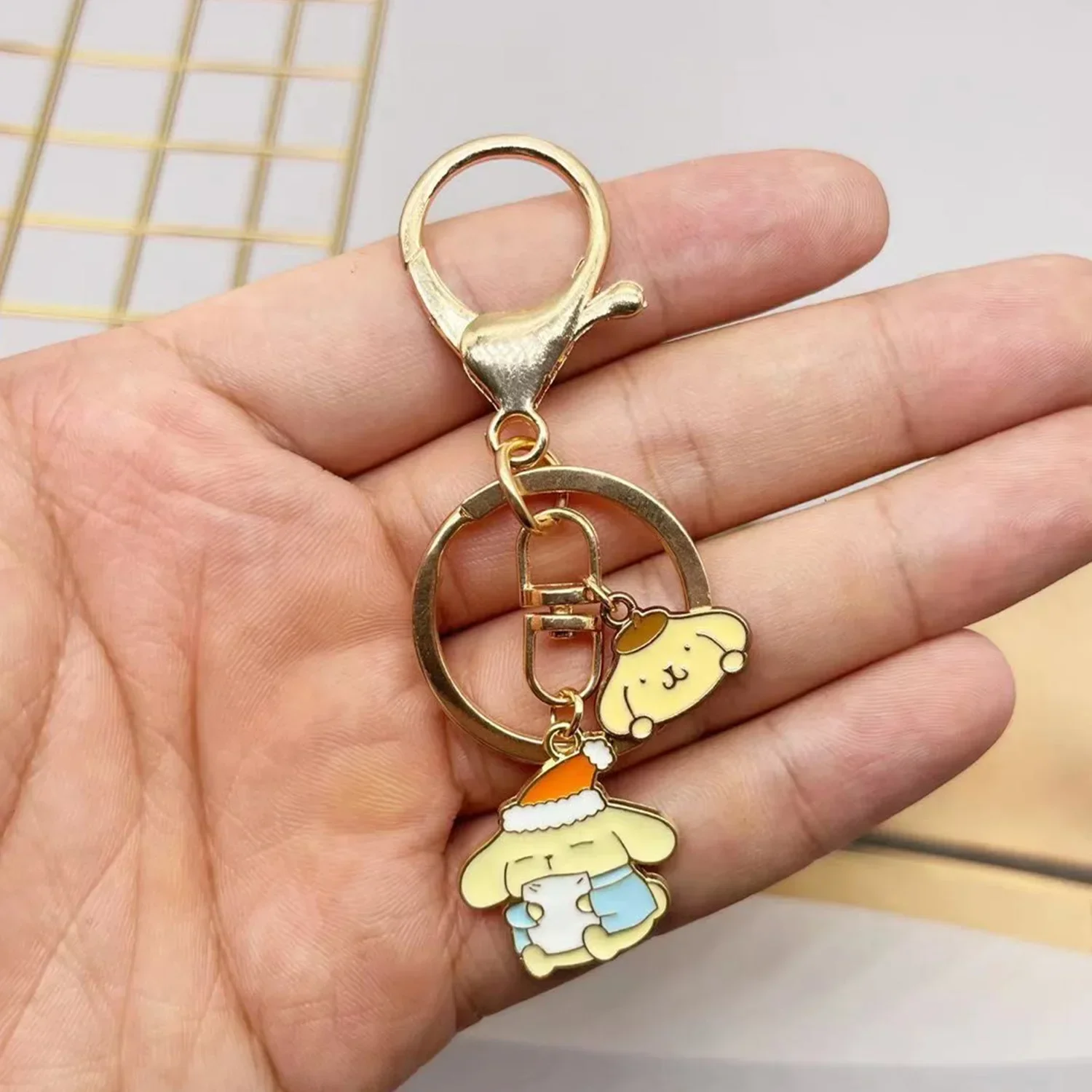 Sanurgente-Porte-clés pompon Purin Cartoon, figurines d'action Hello Kitty, porte-clés de sac à dos de voiture de dessin animé, pendentif mignon, cadeaux