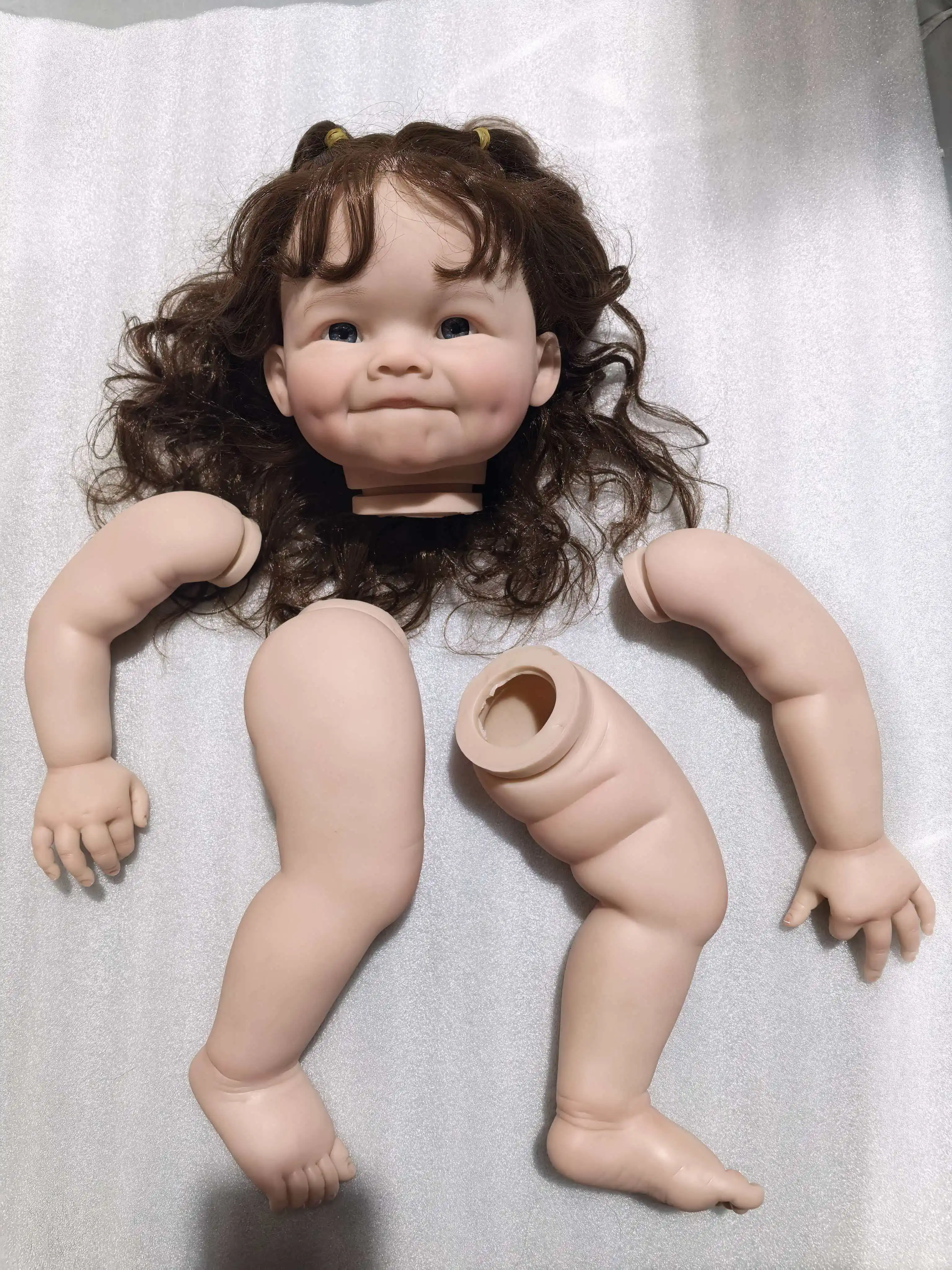 

NPK 24inch Raya Lifelike Unfinished Reborn Doll Kit with Curly Brown Hair Painted Doll Parts for Collectors