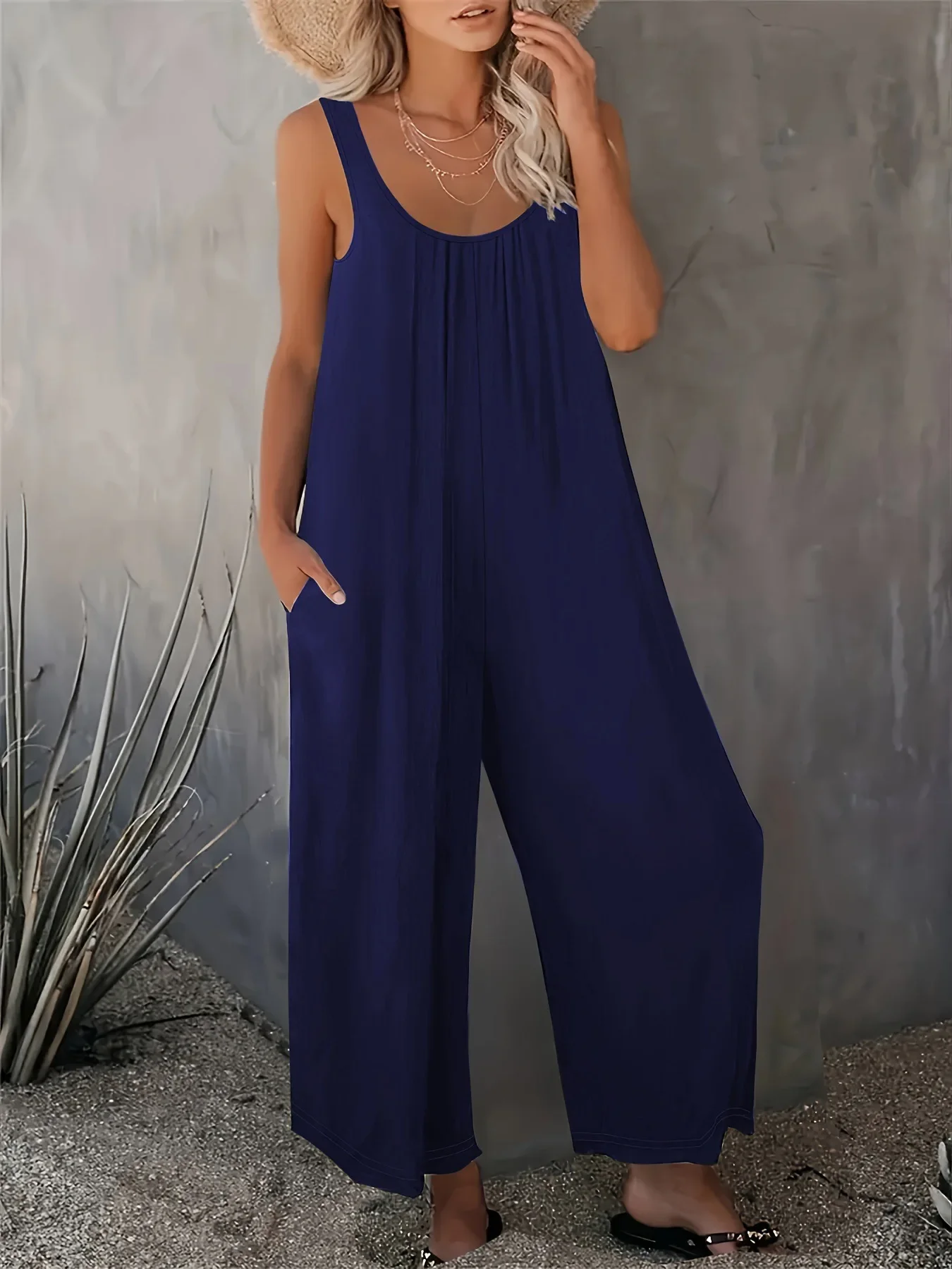 จั๊มพ์สูทแขนกุดลำลองหลวมๆ สีพื้นแบบมีกระเป๋า สไตล์ยุโรปและอเมริกา สำหรับผู้หญิง ฤดูร้อนใหม่