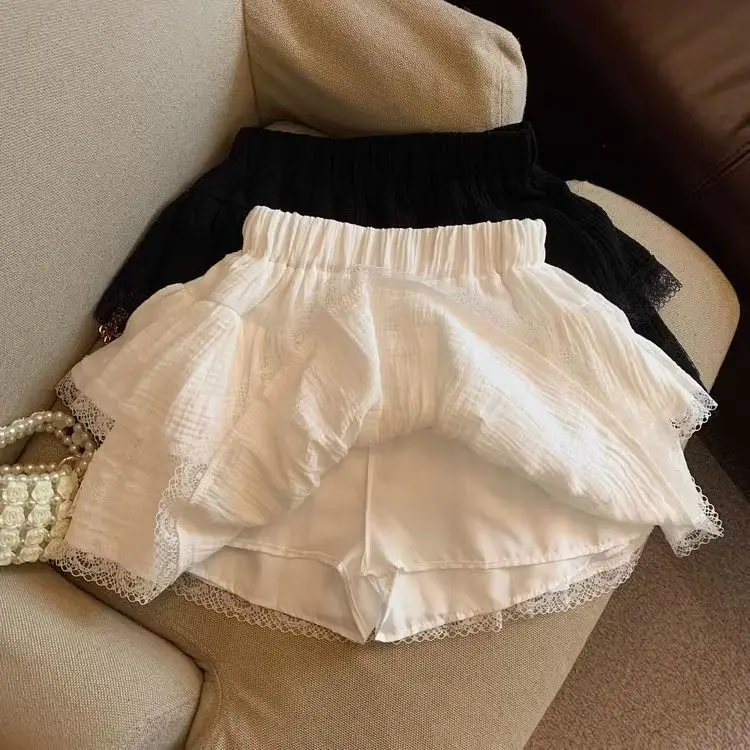 Dulce pastel hinchado faldas de mujer kawaii encaje patchwork negro Mini falda Campus Harajuku Casual versátil cintura elástica falda sólida