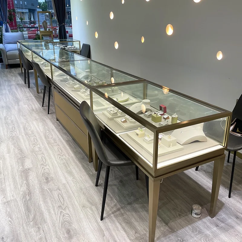 

2025customized. stainless steel jewelry shop display cabinet showcase elegant glass jewelry display counter with lights