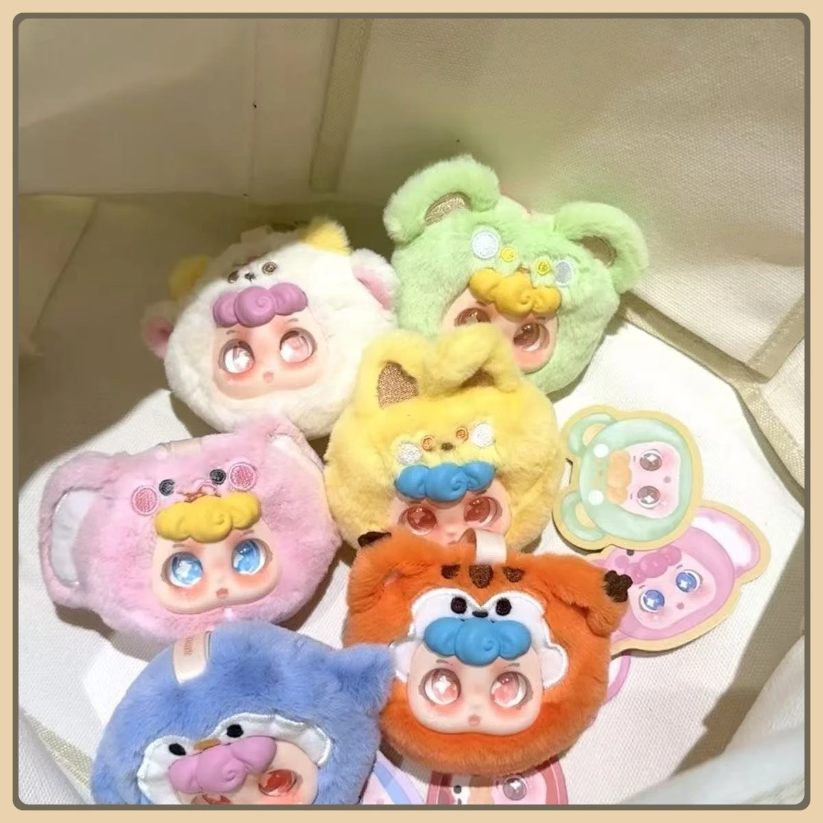 

New Monster blind box The Monsters Doll Blind Box Heart-Moving Macaron Mokoko Anime Figure Guess Bag Hanging High-Quality