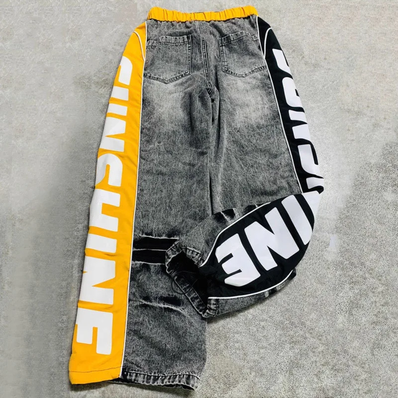ANJY ฤดูใบไม้ร่วงใหม่ผู้หญิงกางเกงยีนส์ DENIM Patchwork ด้านข้างพิมพ์สายรัดเอวยางยืด Streetwear Casual Chic กางเกง A8764