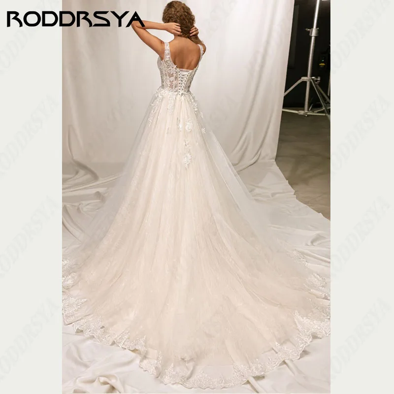 RODDRSYA أنيقة فساتين الزفاف على مستوى واحد رائع تول بلا أكمام brautkleider glitzer مخصص صنع الكلمة طول حفل الزفاف أنيقة فساتين الزفاف على مستوى واحد رائع تول بلا أكمام brautkleider glitzer مخصص صنع الكلمة طول حفل الزف