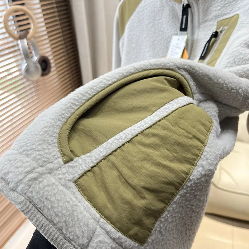 Für den Outdoor-Einsatz im Herbst und Winter ist dieser doppelseitige, warme, dicke, locker geschnittene Mantel mit Stehkragen sowohl für Männer als auch für Frauen geeignet. – Detail 16