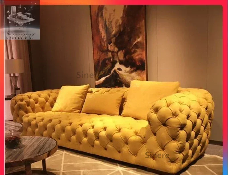 

American light luxury leather sofa first layer cowhide living room French moon surface Italian minimalist buckle high-end sofa