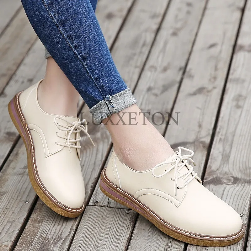 Round Toed Flat Bottomed Women Small Leather Shoes with Cross Straps and Stitching for Breathability Comfort and Versatility