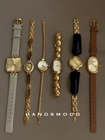 Reloj de lujo de alta gama para mujer, elegancia exquisita y elegante, reloj dorado de 22mm, reloj de pulsera vintage de nicho, reloj de cuarzo para mujer