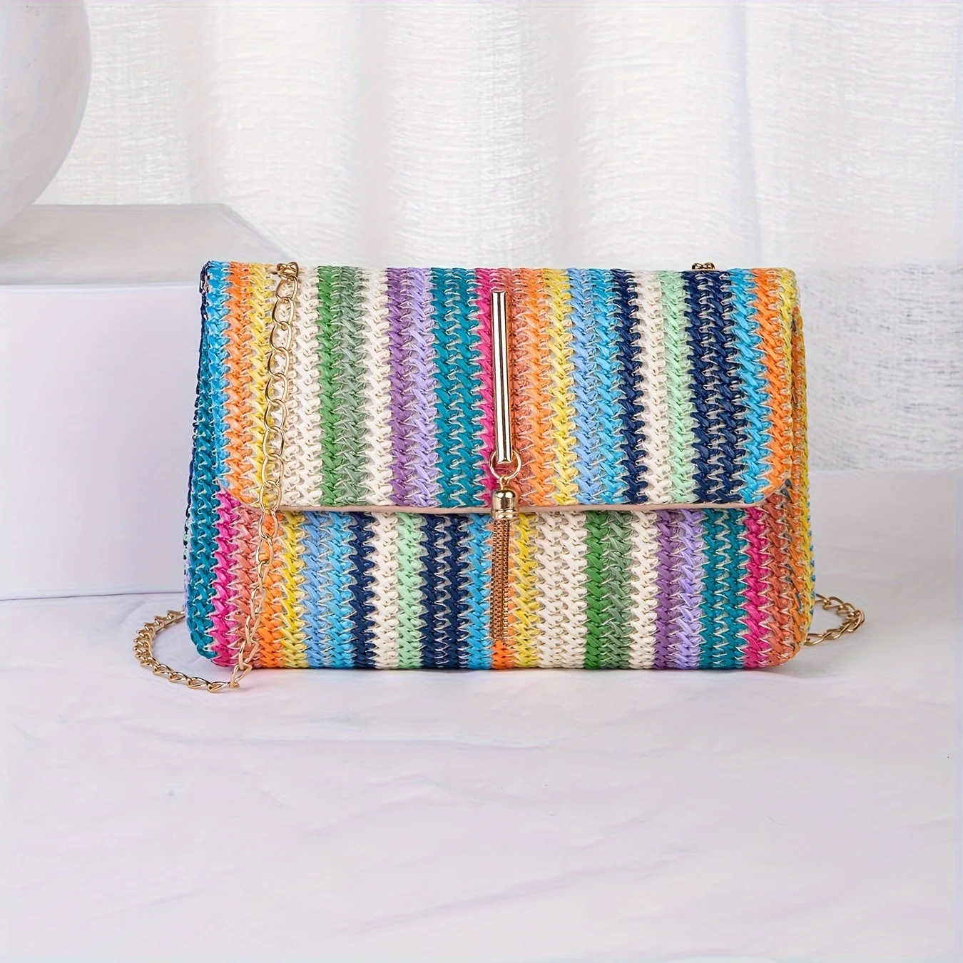 A fashionable tassel hardware accessory, colorful single shoulder diagonal cross bag, makeup bag, phone bag