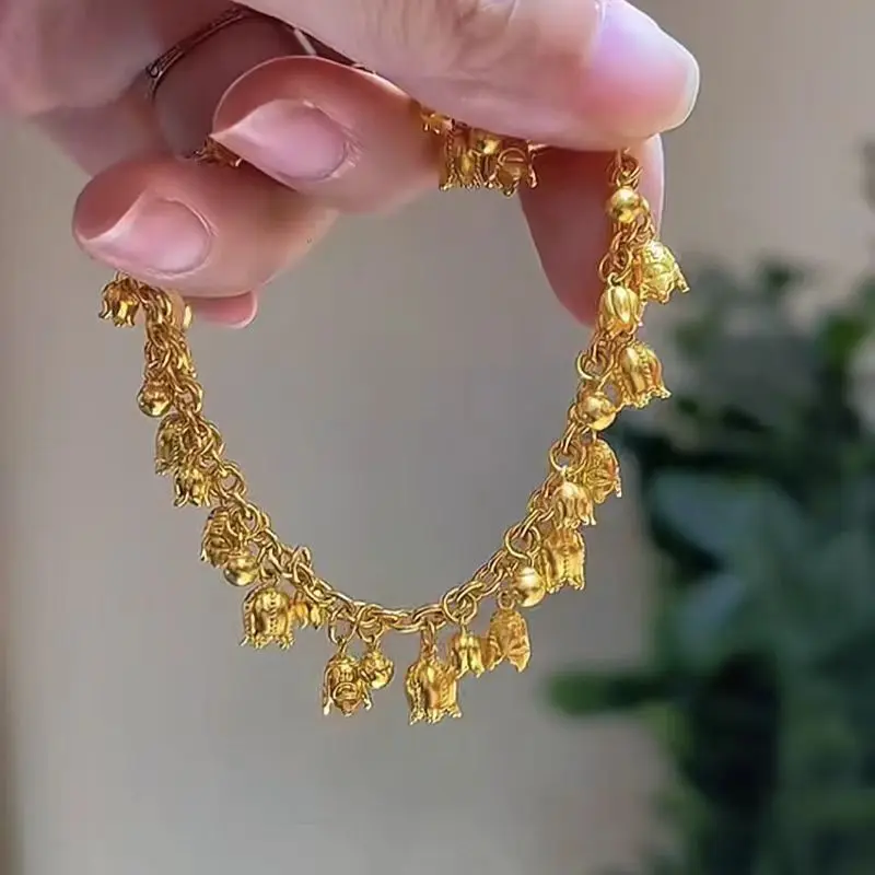 

Women's 24K Gold (AU999) Luxury Lily of the Valley Bracelet | Gradient matte lily, hammered glow with enamel calyx