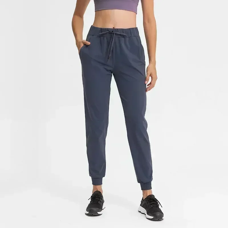 Tessuti elasticizzati al limone pantaloni sportivi da jogging da allenamento larghi pantaloni da Fitness da donna con tasche laterali pantaloni mimetici alla caviglia