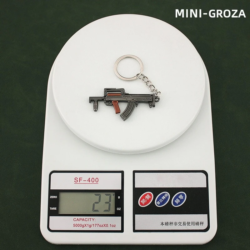 Colgante de periféricos de juego P90 S686 DP-28 Mini llavero de la serie de armas de juguete, modelos de armas de Metal, baratija, regalos pequeños exquisitos para niños