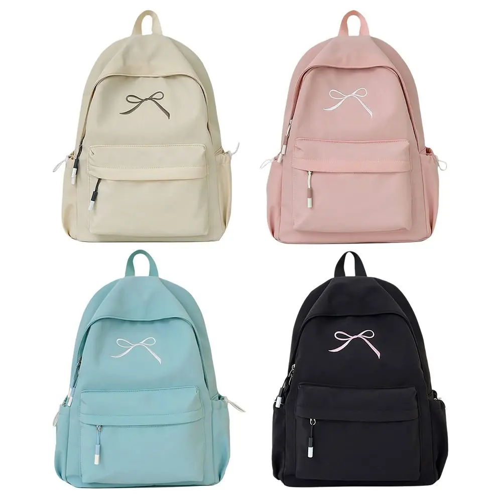 حقيبة ظهر محمولة مطرزة على شكل فيونكة للفتيات من النايلون بلون سادة حقيبة مدرسية للطلاب خفيفة الوزن ذات سعة كبيرة حقيبة ظهر للسفر