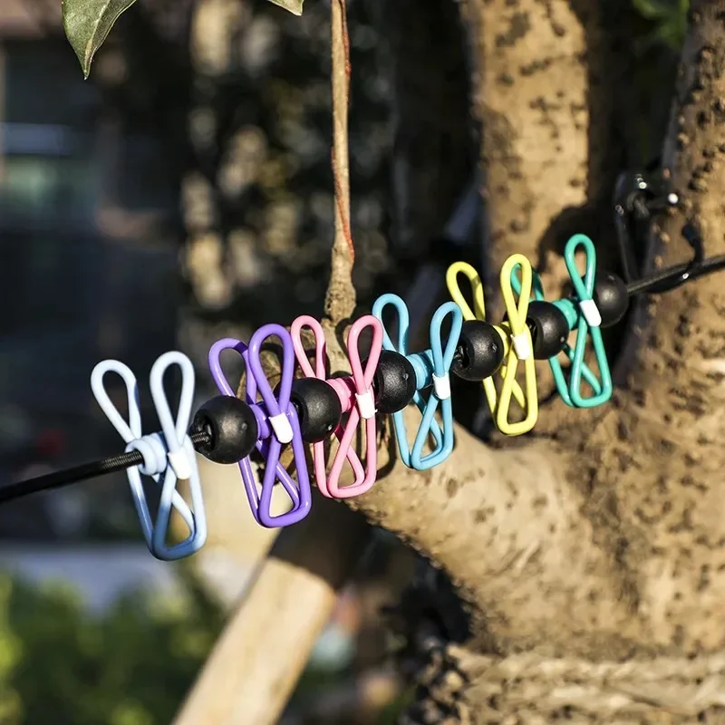 Tragbarer, elastischer Reise-Kleiderständer, winddichte Outdoor-Wäscheleine mit 12 Clips, Wäscheleine für den Balkon im Hinterhof