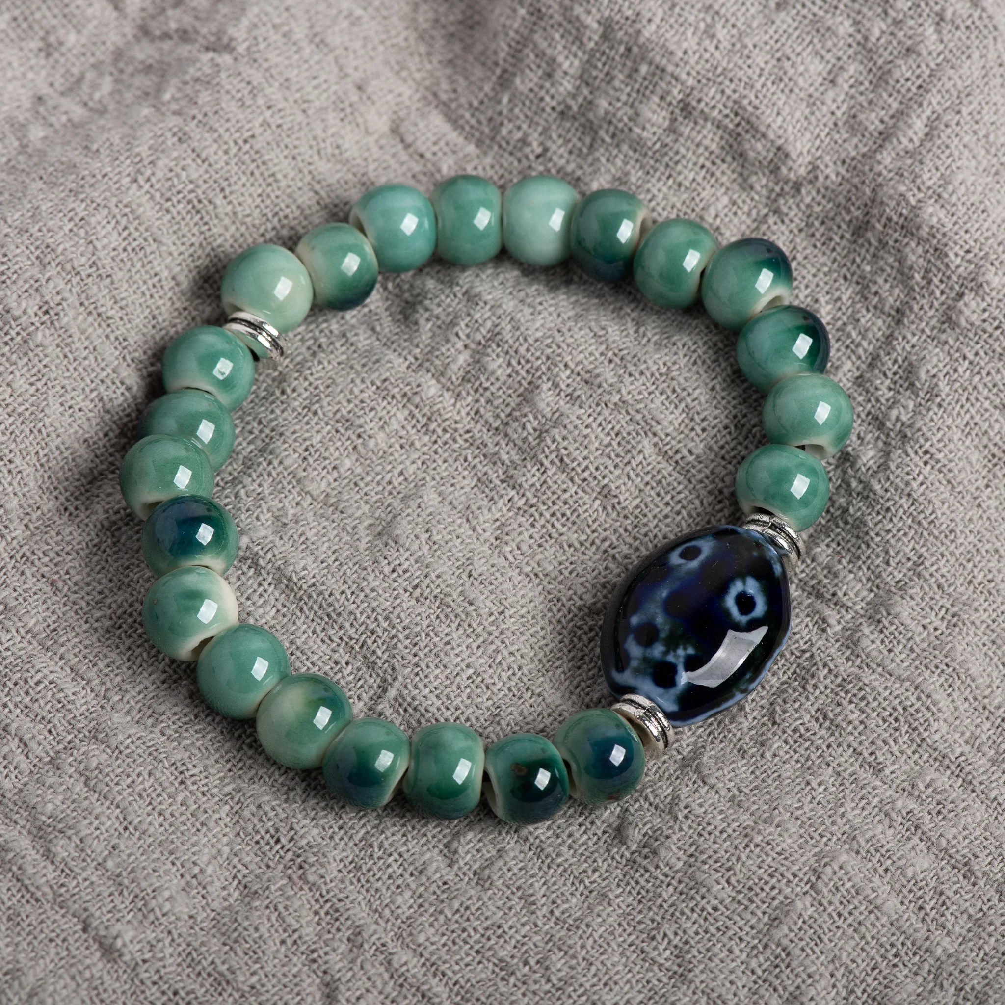 Green Ceramic Beaded Bracelet Handmade Stretch Bracelet with Blue Accent Stone Unisex Jewelry Vintage Style