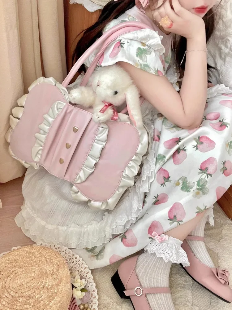 Busur Lolita tas Niche semua cocok lucu lembut gadis JK tas bahu 2024 permen Jepang desain Kawaii PU tas tangan