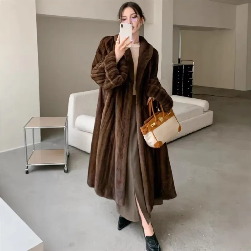 The new hybrid fur coat a long is warm yet classic and luxurious with integrated in one