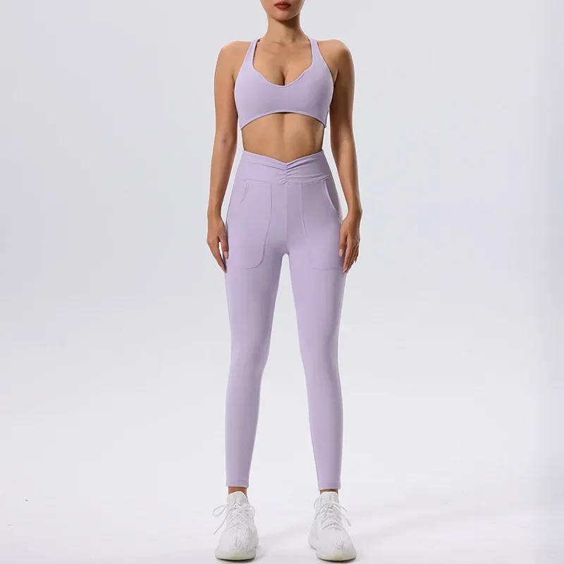 Mulher esportiva ginásio yoga sutiã calças conjuntos com bolsos esporte curto leggings duas peças terno de fitness roupas de treino roupas femininas