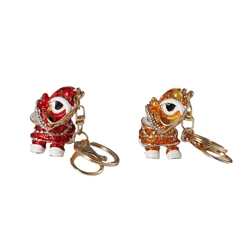 مفتاح حامل المهرجان الصيني التقليدي استدارة الرقص الأسد المفاتيح سيارة مفتاح سلسلة كريستال الرقص كيرينغ محفظة قلادة