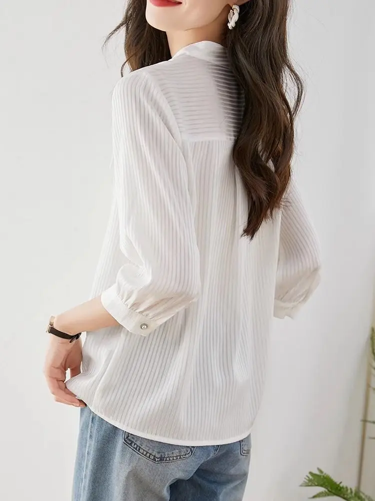 スタイリッシュな V ネックストライプシャツ女性の夏の新ファッションハイエンドルーズ痩身薄型ノースリーブトップ