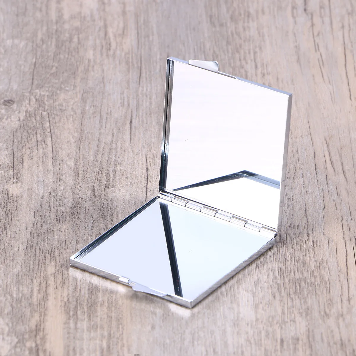 Lightweight Portable Compact Mirror Dual Sided Hd Reflective Surface Polished Metal Housing Small Size Pocket Friendly Travel