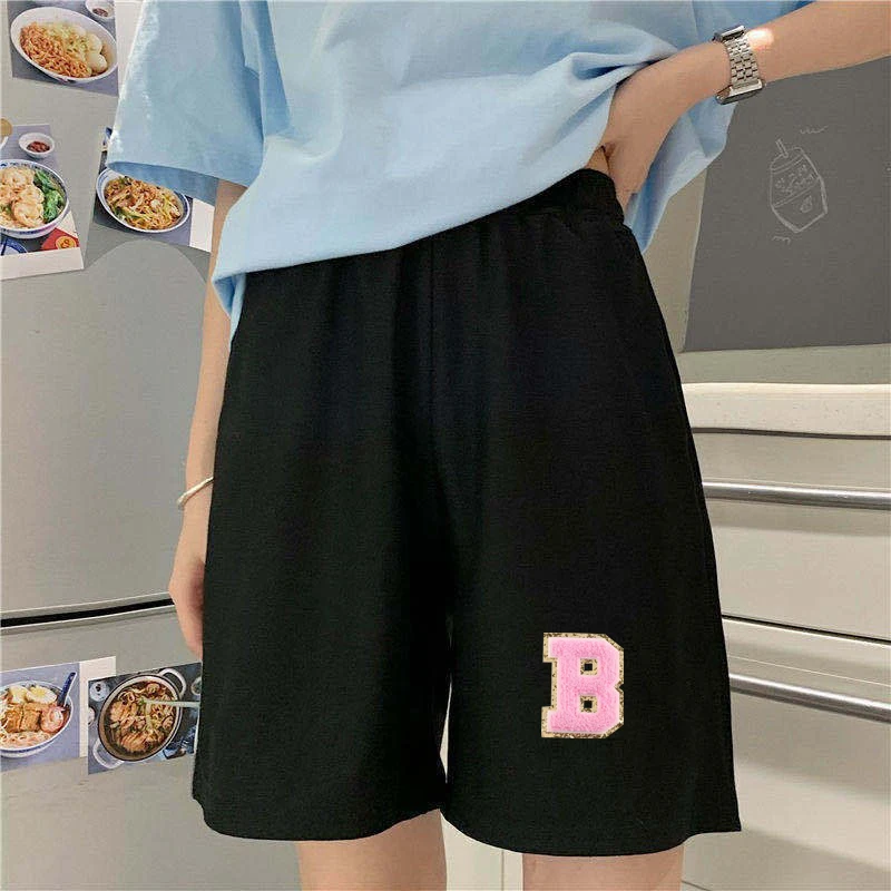 Pantaloncini a trapezio casual con stampa fluff da donna primavera estate Pantaloncini a gamba larga Pantaloncini morbidi casual neri chic da donna