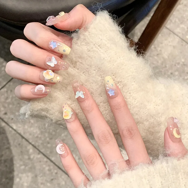 

Maillard wears a Mocha Xingyue Butterfly Manicure, and the wearable nail stickers are finished in Yiwu nail factory wholesale.