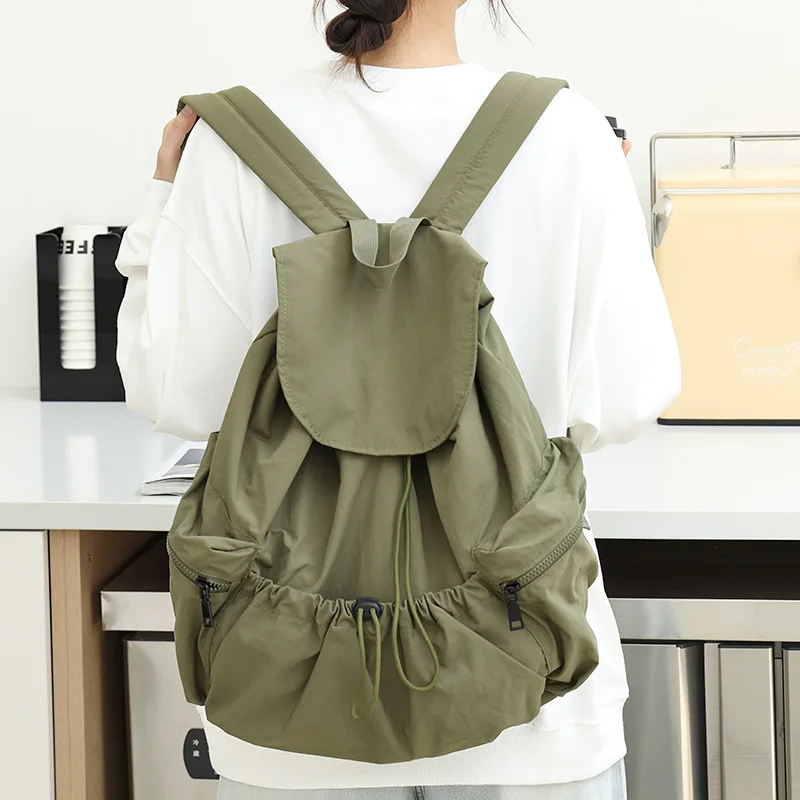 

Casual Women Backpack Nylon Travel Bags Female Solid Drawstring Canvas Backpacks Main material: nylon