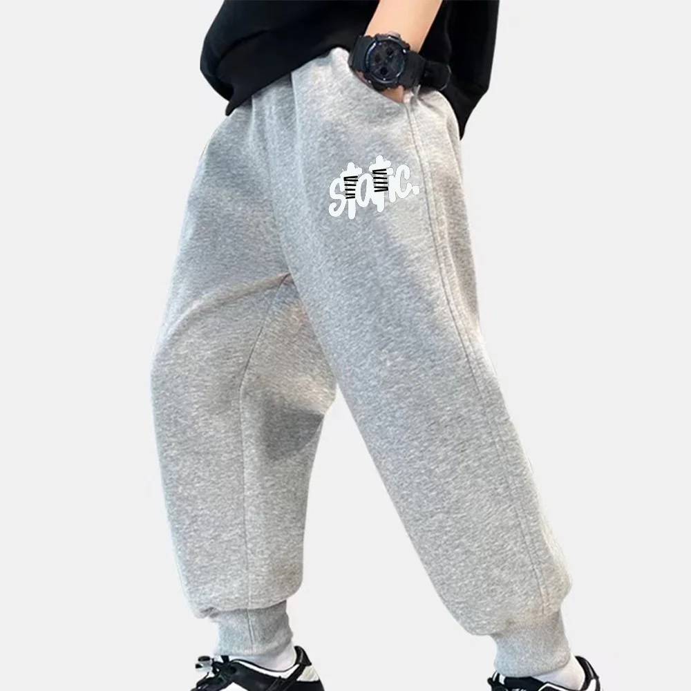 Autumn children's nine-point pants Children's casual black slash letter-printed pants for boys and girls girdle feet sweatpants