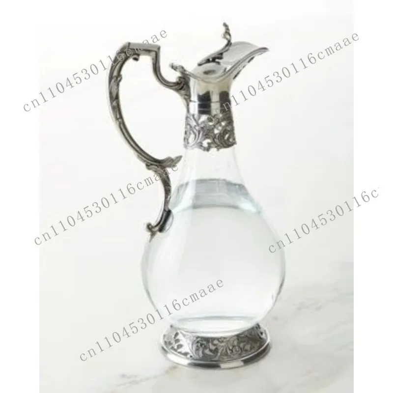

A Transparent Fancy Wine Jug Bar Accessory Made of A Flower Base and Handle