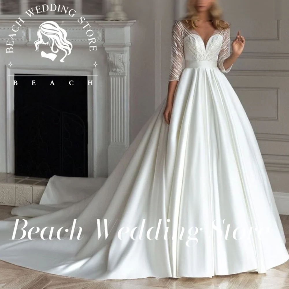 

Beach Customized Elegant V-Neck Long Sleeve Wedding Backless Beaded Three Quarter Shinny Satin Sweep Train Gown Robe De Mariee