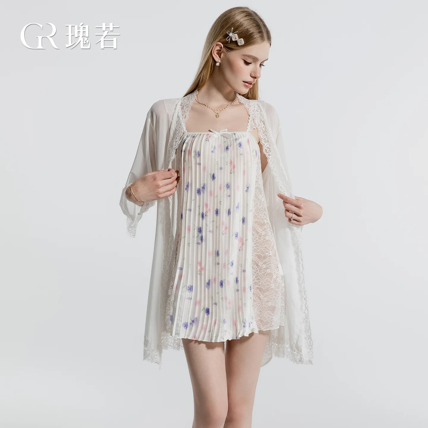 

A lady's sweetly printed pleated satin sheer lace with bow embellishment camisole nightgown, a comfortable two-piece set
