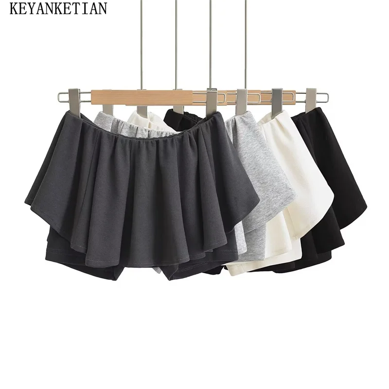 KEYANKETIAN 2024 New Launch Women's Tutu Elastic Force Skirt Spicy Girl Summer Slim Low waist Solid color Asymmetrical Pantskirt