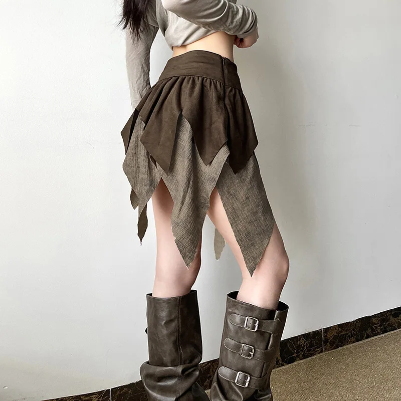 ملابس نسائية جديدة للخريف على الطراز الأوروبي الأمريكي بلون سادة تناسب أزياء الشارع تنورة غير منتظمة عالية الخصر للسيدات