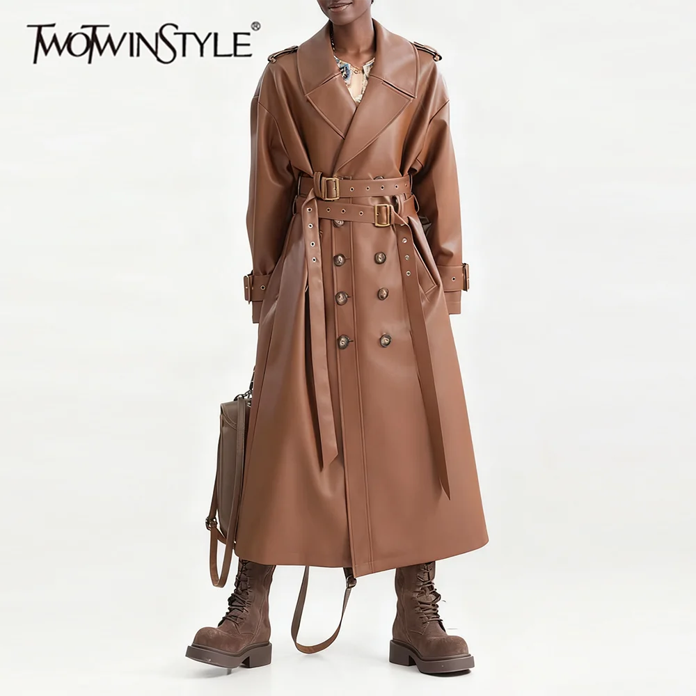 TWOTWINSTYLE Solid Spliced Belts Fashion Trenchs for Women Lapel Long Sleeves Patchwork Double Breasted Leather Trench Female